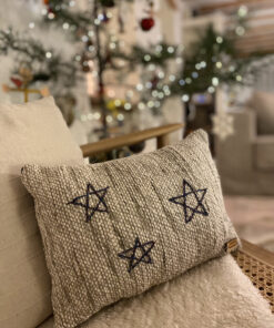 woven cushion with stars